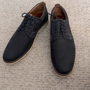 Brand new navy suede shoes, never worn.